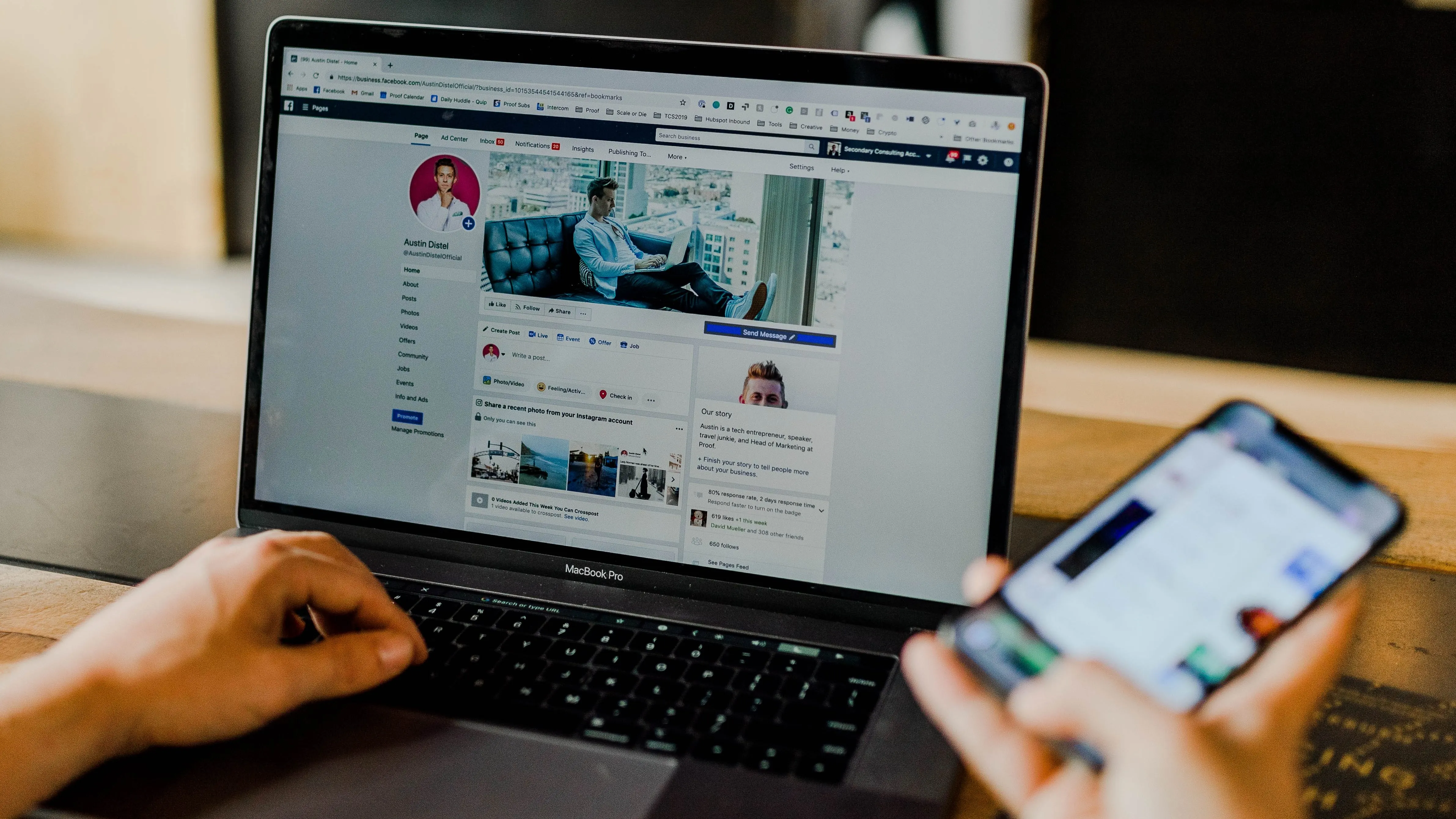 Person using Facebook on a laptop and mobile phone